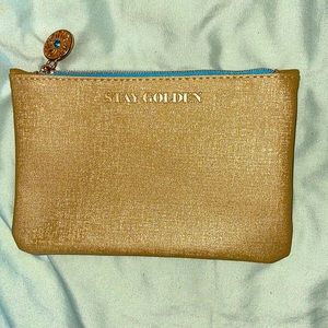 ‘Stay Golden’ cosmetic bag with unique design
